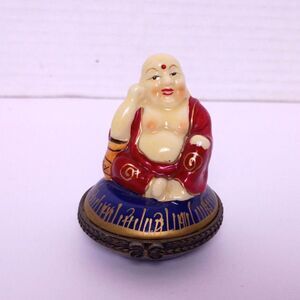Vintage Porcelain Hinged Box Laughing Buddha Figurine Sitting on Blue Pillow
